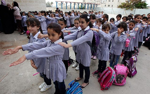 Illustrative photo: Palestinian students seen on their first day of the new school year in the West Bank city of Ramallah, on August 25, 2013. (Issam Rimawi/FLASH90)