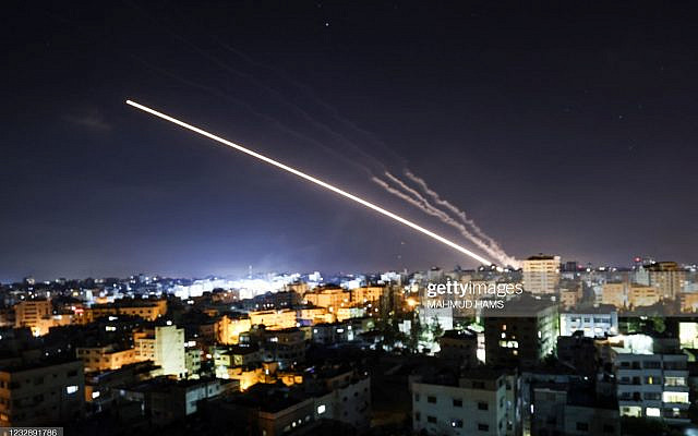 Rockets are launched from Gaza City, controlled by the Palestinian Hamas movement, towards Israel early on May 15, 2021. - Israel faced a widening conflict on May 14, as deadly violence erupted across the West Bank amid a massive aerial bombardment in Gaza and unprecedented unrest among Arabs and Jews inside the country. (Photo by MAHMUD HAMS / AFP) (Photo by MAHMUD HAMS/AFP via Getty Images)