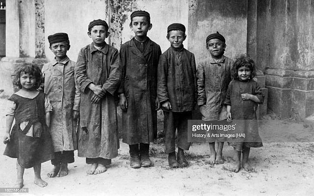 Russian / Polish  shtetl or Jewish village, Children outside their home, Barefoot. (Photo by History & Art Images via Getty Images)
