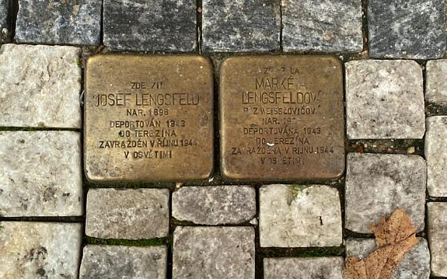 Two Holocaust stones are situated side by side near Prague's Tančící Dům landmark.

Source: Allia Bukhari