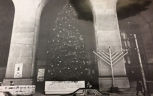 A menorah and Christmas tree on the steps of Pittsburgh, Pennsylvania's City-County Building. (Pittsburgh Jewish Chronicle/Toby Tabachnick)