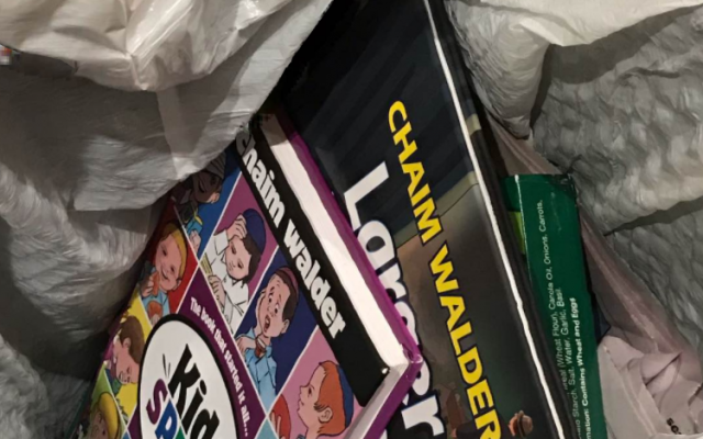 Chaim Walder's books for children, now in the garbage. (Facebook, Ariele Mortkowitz)