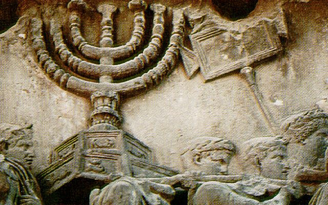 Roman soldiers carrying off the Hasmonean Menorah, as depicted on Titus' arch