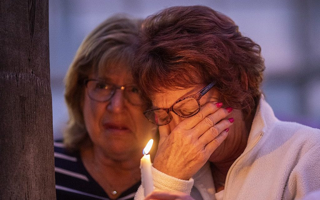People attend a prayer and candlelight vigil at Rancho Bernardo Community Presbyterian Church on April 27, 2019 in Poway, California. (David McNew/Getty Images/AFP)