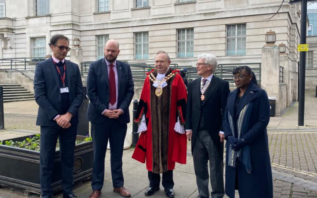 Laying flowers at the Holocaust Memorial outside the Town Hall (l to r) Chief Executive, Mark Carroll, Mayor Phil Glanville, Speaker, Cllr Michael Desmond, Deputy Lieutenant (the Queen’s representative) Stephen Howlett, CBE and Deputy Mayor, Cllr Anntoinette Bramble.