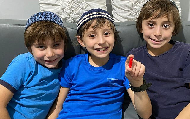 Avraham (8), Yehdua (10) & Moshe (10) Ben Shalom ready to trade their one red Lego.