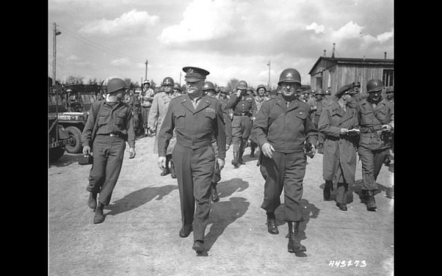 US General Dwight Eisenhower and General Troy Middleton tour the newly liberated Ohrdruf concentration camp, a German forced labor and concentration camp that was part of the Buchenwald concentration camp network. (PD / William Newhouse)