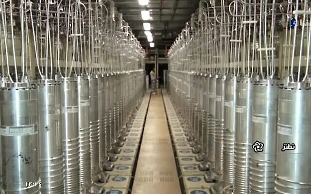 Various centrifuge machines line a hall at the Natanz Uranium Enrichment Facility, on April 17, 2021. (screenshot, Islamic Republic Iran Broadcasting – IRIB, via AP)