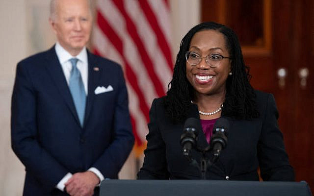 TOPSHOT - Judge Ketanji Brown Jackson, with President Joe Biden, speaks after she was nominated for Associate Justice of the US Supreme Court, in the Cross Hall of the White House in Washington, DC, February 25, 2022. (Photo by SAUL LOEB / AFP) (Photo by SAUL LOEB/AFP via Getty Images)