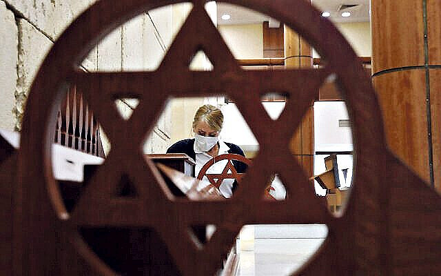 Sanitizing a synagogue. Vladimir Gerdo/TASS (Via Jewish News)