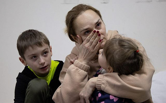A woman cries next to her children in a Kyiv bomb shelter. . Photo by Raphael Lafargue/ABACAPRESS.COM (Via Jewish News)