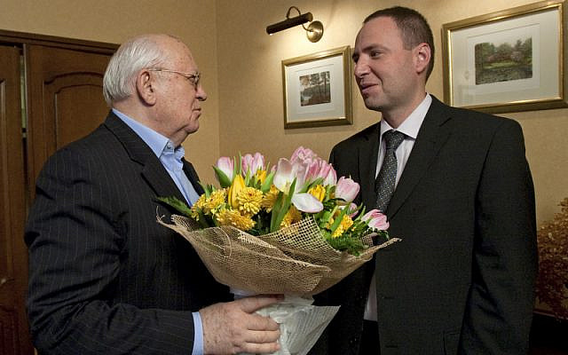 Gorbachev receiving his birthday bouquet (photo courtesy Dan Perry)