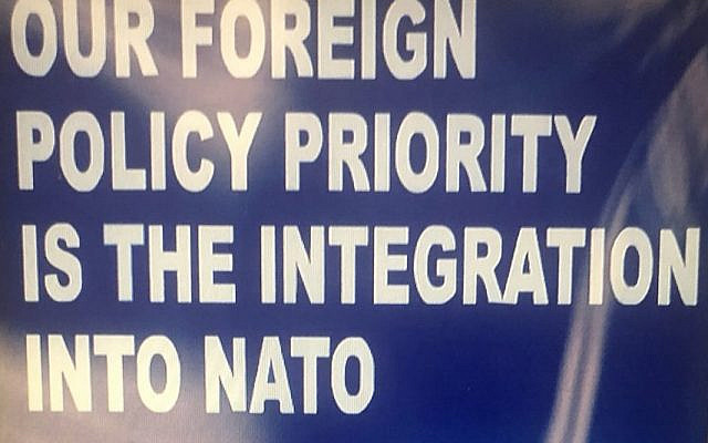 An August 2009 sign in Tbilisi promoting eventual integration with NATO (source: Wikipedia).