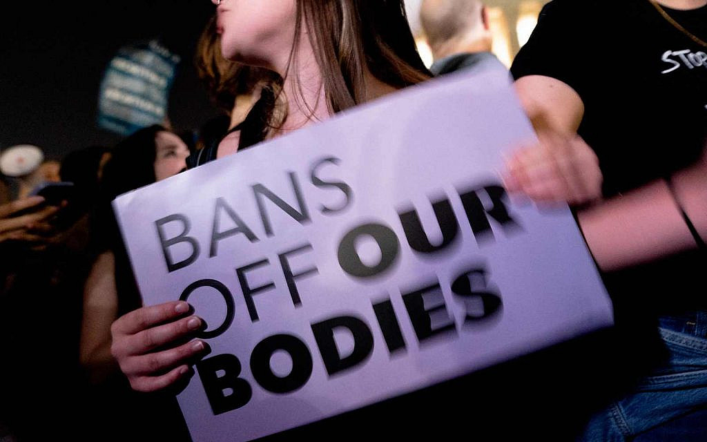 A pro-choice activist holds a sign at a protest at the U.S. Supreme Court, Washington, DC, May 2, 2022.(Stefani Reynolds/AFP via Getty Images)