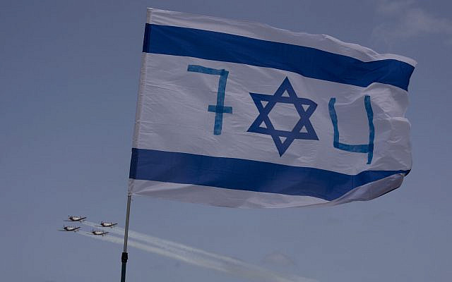 Israeli aircraft performs over Tel Aviv, Israel, for the country's 74th Independence Day, Thursday, May 5, 2022. (AP Photo/Maya Alleruzzo)