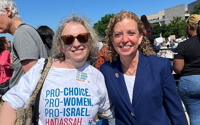 The author with Congresswoman Debbie Wasserman Schultz (FL-23) at the May 17th rally in Washington, DC. Photo courtesy of the author.