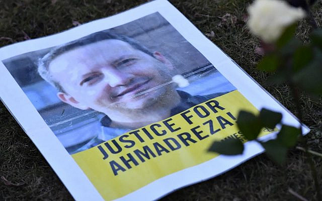 A flyer during a protest outside the Iranian embassy in Brussels for Ahmadreza Djalali, an Iranian academic detained in Tehran for nearly a year and reportedly sentenced to death for espionage, February 13, 2017. (DIRK WAEM / Belga / AFP /File)