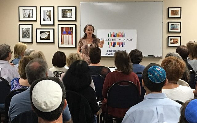Estelle Frankel teaching Torah to adult learners at a Valley Beit Midrash event.