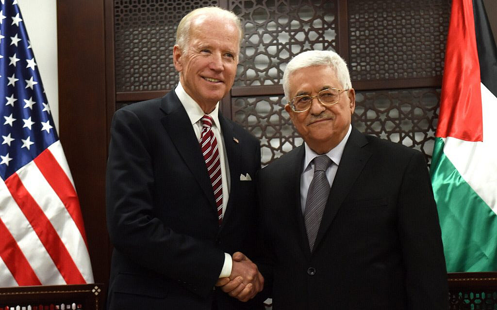 Then-US vice president Joe Biden, left, and Palestinian Authority President Mahmoud Abbas, right, at the presidential compound in Ramallah, March 9, 2016. (Debbie Hill, Pool via AP/File)