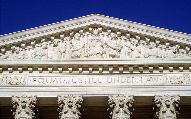 The inscription, 'Equal Justice Under Law,' as seen on the frieze of the United States Supreme Court building. (MattWade, CC BY-SA 3.0, via Wikimedia Commons)