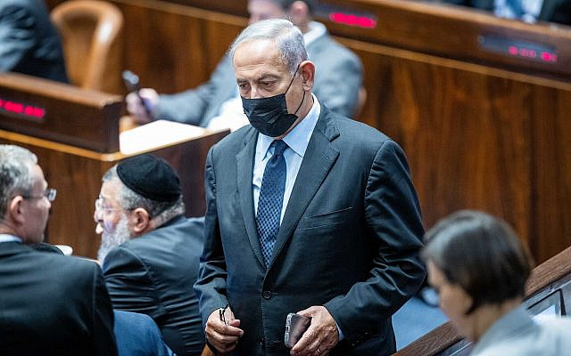 Opposition leader Benjamin Netanyahu in the Knesset plenum during a vote on the so-called settler law, June 6, 2022. (Yonatan Sindel/Flash90)