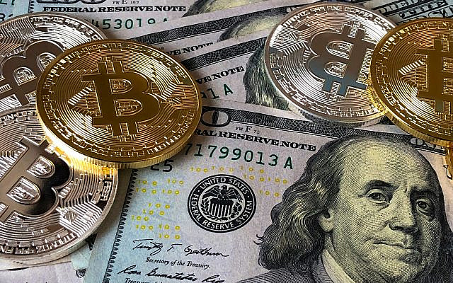 Bitcoins and U.S Dollar Bills, Photo by David McBee on Pixels