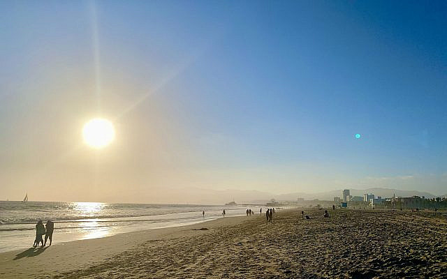 Setting sun on Santa Monica Beach, California