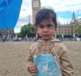 A 5-year-old girl on Urumqui Day - Vimarsana News