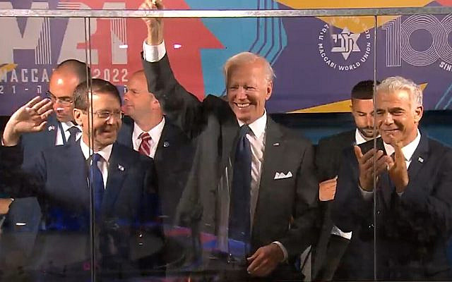 Left to right: President Isaac Herzog, US President Joe Biden and Prime Minister Yair Lapid attend the Maccabiah opening ceremony at Jerusalem's Teddy Stadium on July 14, 2022. (Screenshot)