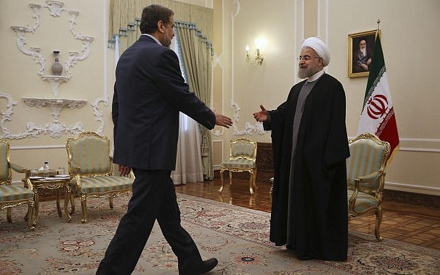 Iranian President Hassan Rouhani, right, welcomes head of the Palestinian Islamic Jihad Ramadan Abdullah Shallah for their meeting at the presidency office in Tehran, Iran, Thursday, May 5, 2016. (AP Photo/Vahid Salemi)
