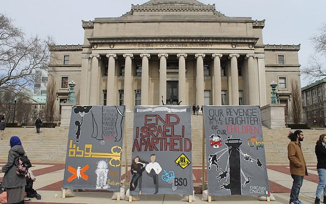 Illustrative: anti-Israel students at Columbia University erect a mock 'apartheid wall' in front of the iconic Low Library steps during Israel Apartheid Week, March 3, 2016. (Uriel Heilman)