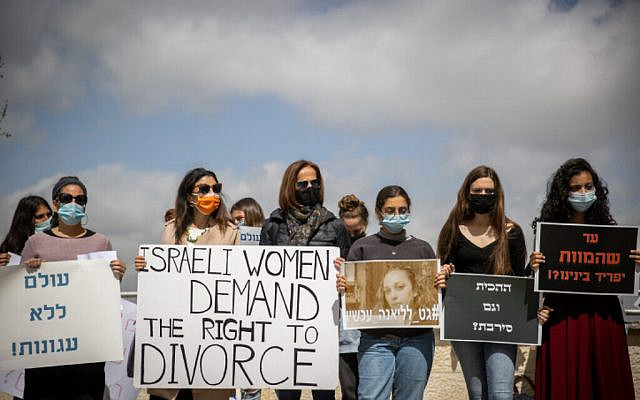Women's rights activists protest outside the Rabbinical Court in Jerusalem March 8, 2021, during women's day. Photo by Yonatan Sindel/Flash90