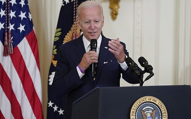 FILE - President Joe Biden speaks during an event in the East Room of the White House, Aug. 10, 2022, in Washington. Biden will host a White House summit next month aimed at combatting a spate of hate-fueled violence in the U.S., as he works to deliver on his campaign pledge to "heal the soul of the nation." (AP Photo/Evan Vucci, File)