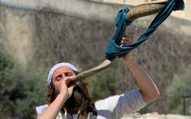 Blowing the Shofar in Jerusalem.  Photo (c) Tuvia Book, 2022
