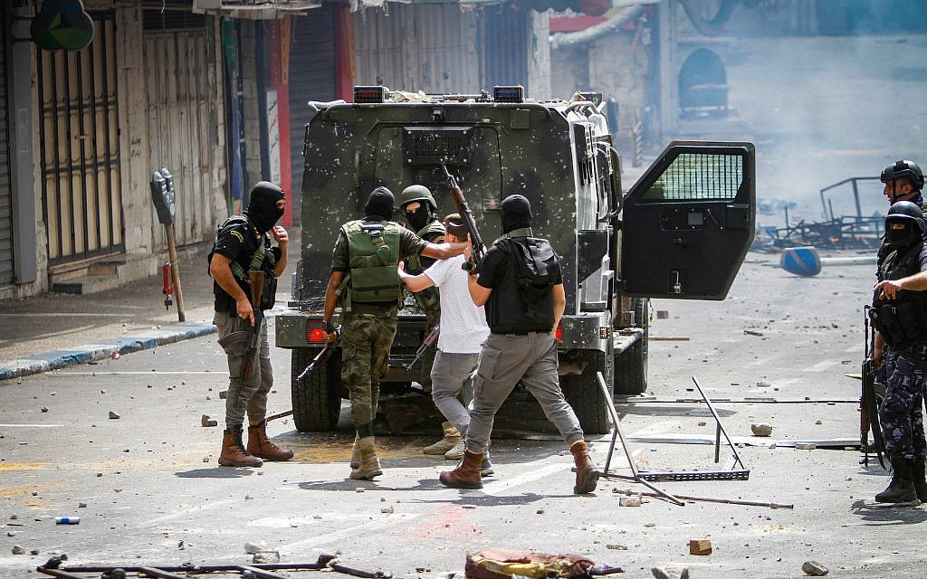 Palestinians clash with Palestinian security forces in Nablus, in the West Bank on September 20, 2022, following the arrest of Hamas members by Palestinian security forces. (Nasser Ishtayeh/Flash90)