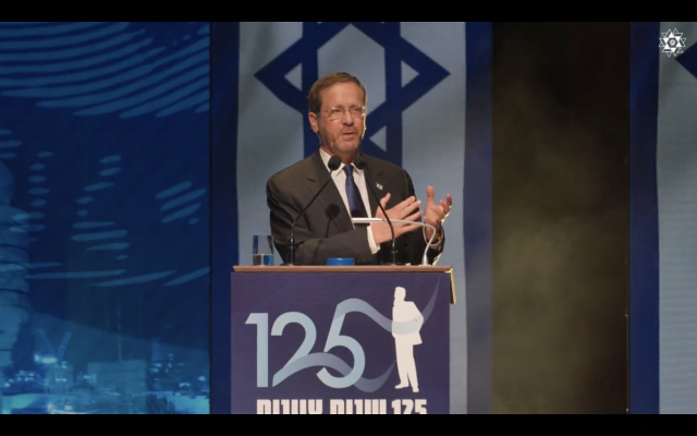 President Isaac Herzog addresses an event marking the 125th anniversary of the First Zionist Congress in Basel, Switzerland, on August 29, 2022. (Screenshot)