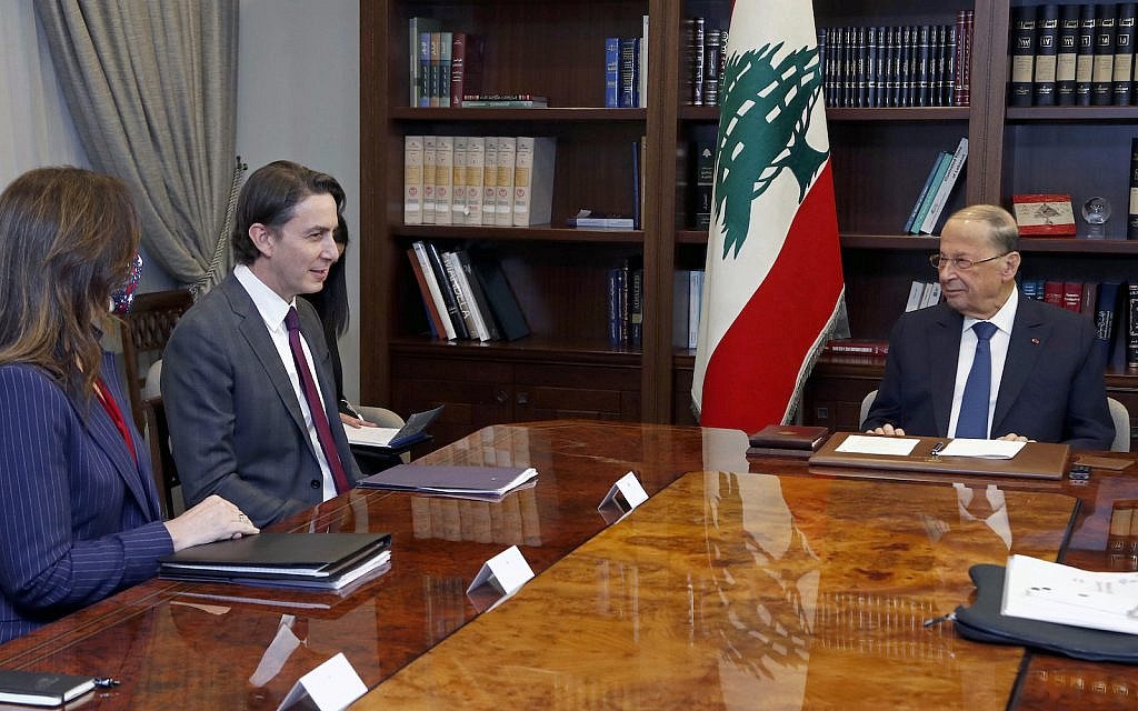 In this photo released by Lebanese government, Lebanese President Michel Aoun, right, meets with US Envoy for Energy Affairs Amos Hochstein, center, and US Ambassador to Lebanon Dorothy Shea, left, at the presidential palace in Baabda, east of Beirut, Lebanon, February 9, 2022. (Dalati Nohra/Lebanese Official Government via AP)