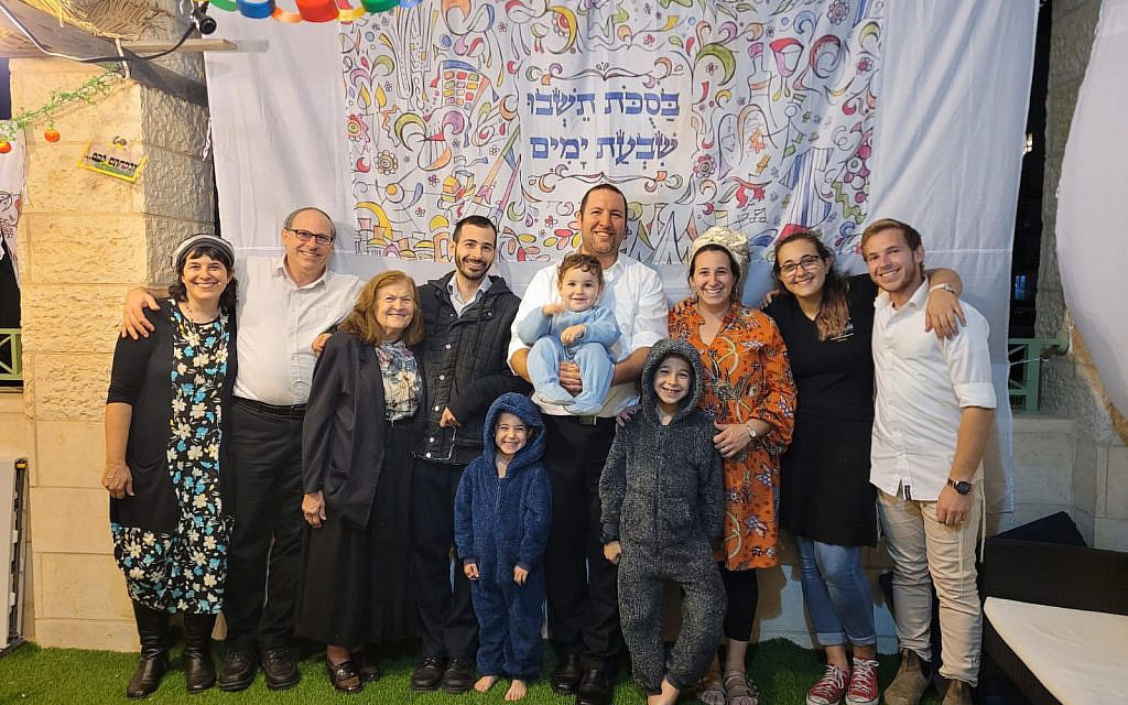 After my husband and I (and our three little boys) hosted my three siblings, my parents, and my grandmother for Sukkot, a family portrait! So much fun, truly blessed, and also exhausted! (courtesy)