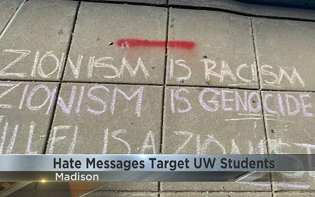 Graffiti targeting 'Zionist' student groups was spotted in multiple locations around the University of Wisconsin campus on the first day of the semester, September 2022. (Screenshot/WKOW, used in accordance with Clause 27a of the Copyright Law)