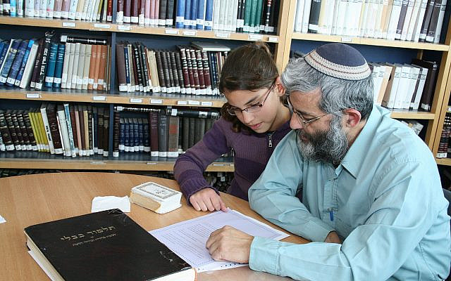 Illustrative: Father and daughter learn together in preparation for her Bat Mitzva at The Stella K. Abraham Beit Midrash for Women (A.K.A. Migdal Oz), an Orthodox Jewish institution of higher Torah study for women, located in Gush Etzion, Israel. 	March 19, 2009 (Flash90)