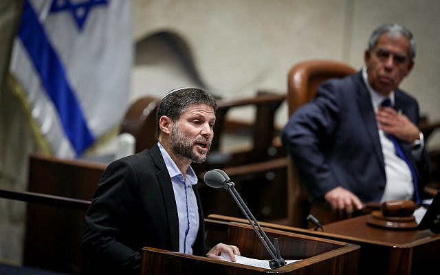 Religious Zionism party head Bezalel Smotrich speaks in the Knesset during a memorial ceremony marking 27 years since the assassination of prime minister Yitzhak Rabin, in Jerusalem, November 6, 2022. (Noam Revkin Fenton/ Flash90)