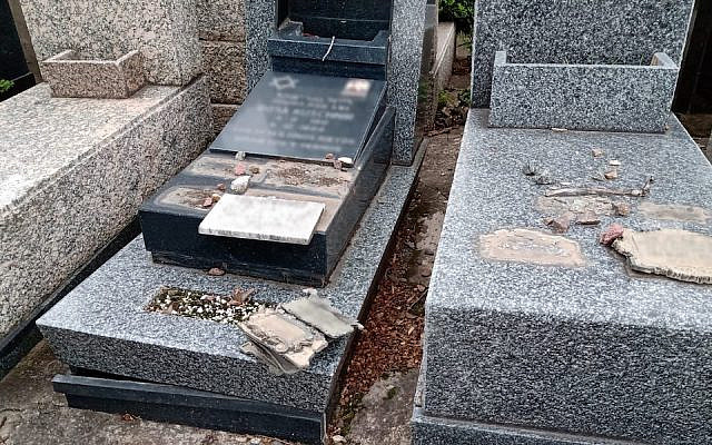 Some of the vandalized graves at the Tablada Jewish cemetery near Buenos Aires. (Courtesy of AMIA via JTA)