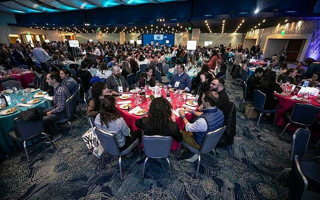 Attendees celebrating 25 years of FJC at the Georgia Aquarium