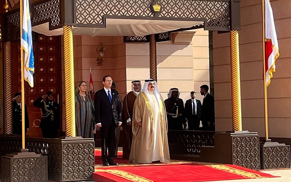 President Isaac Herzog (front L) and King Hamad bin Isa Al Khalifa (front R) at the Al Qudaibiya palace in Manama, December 4, 2022. (Lazar Berman/Times of Israel)