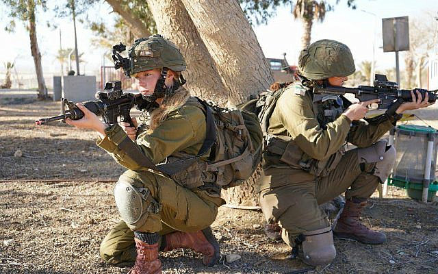 Illustrative: Female soldiers during training, in an undated photography published by the military on June 7, 2022. (Israel Defense Forces)