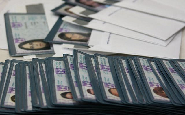 Illustrative. Non-biometric Israeli ID cards, prepared for new immigrants from different countries, in an absorption center in Jerusalem, January 22, 2008. (Anna Kaplan/Flash90/File)