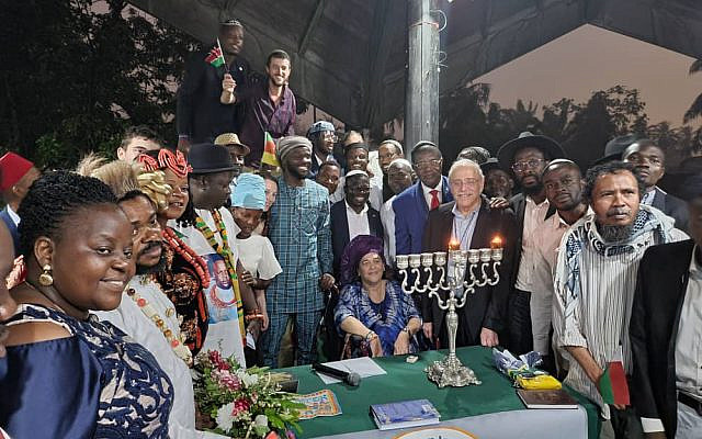 Members of SAJA celebrate Chanuka with Rabbi Gerald and Rabbanit Bonita Sussman