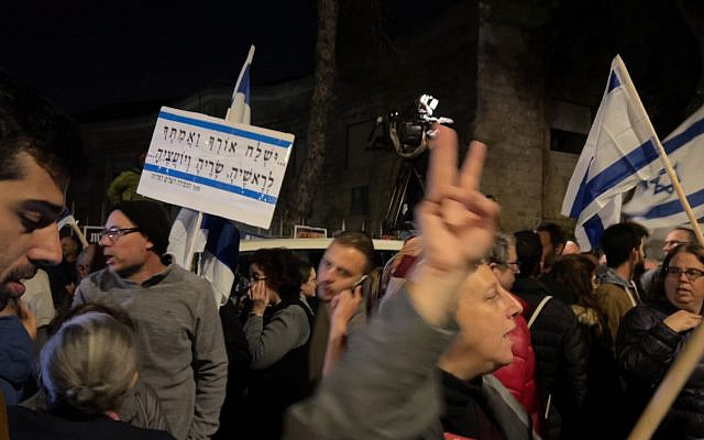 Demonstrators in Jerusalem last Motzei Shabbat. The sign reads: 'Send your light and your truth to her leaders, ministers and advisors (Prayer for the Peace of the State)'.