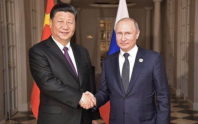 https://commons.wikimedia.org/wiki/File:Vladimir_Putin_and_Xi_Jinping,_26_july_2018_%281%29.jpg