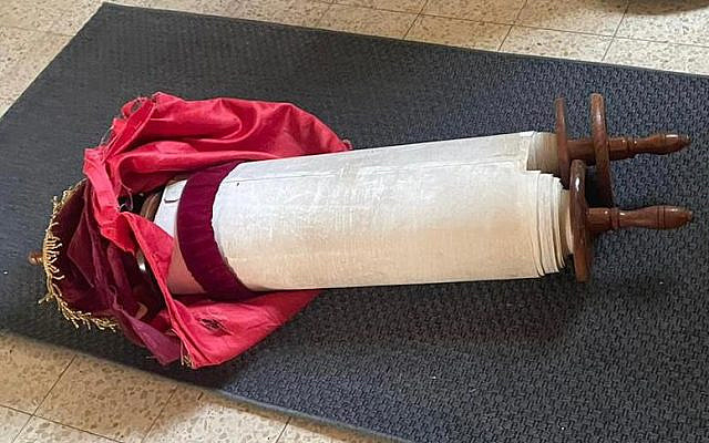 Torah scroll as found in the ransacked synagogue in Zichron Yaakov this week